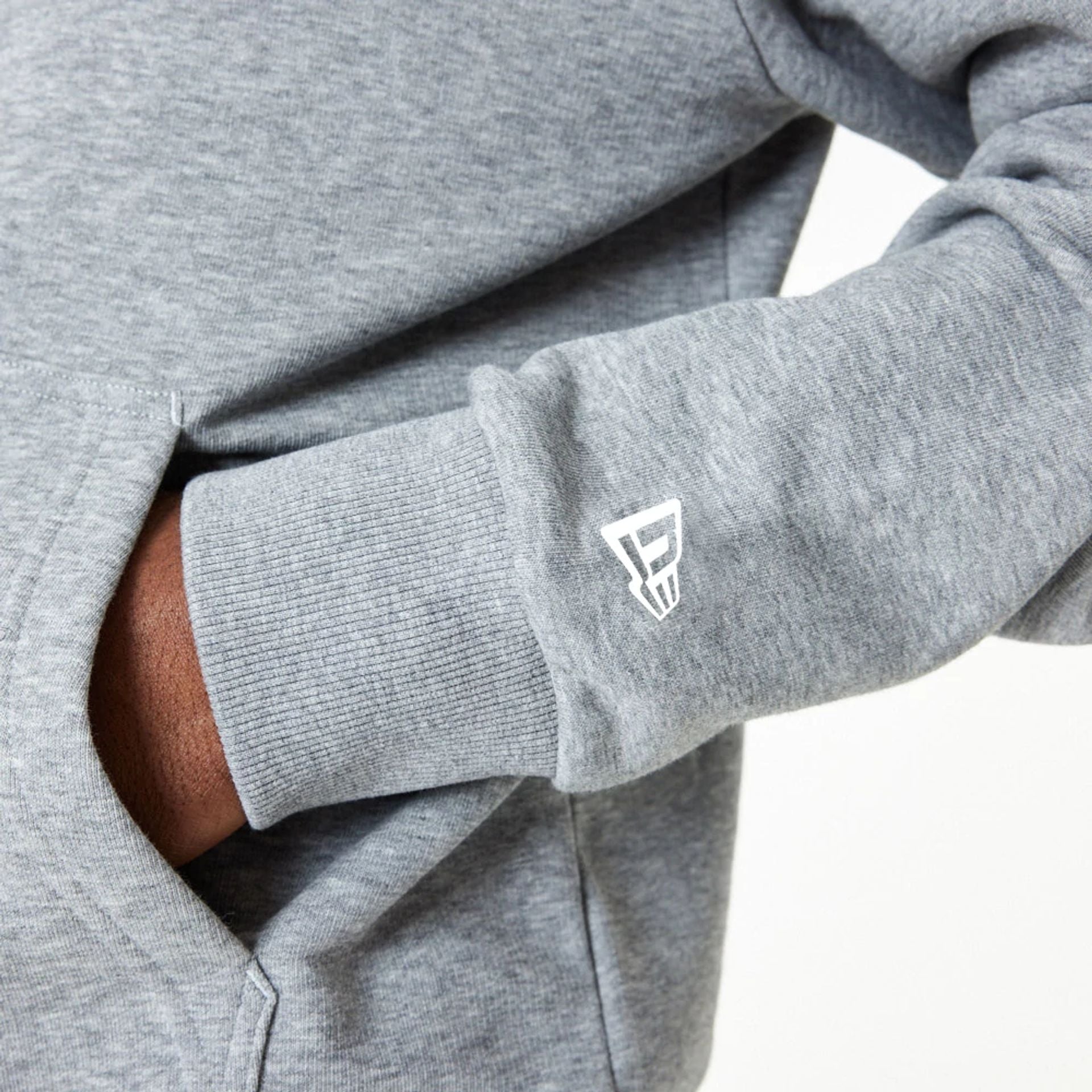 The Male model is wearing New Era Essential Grey Pullover Hoodie 4