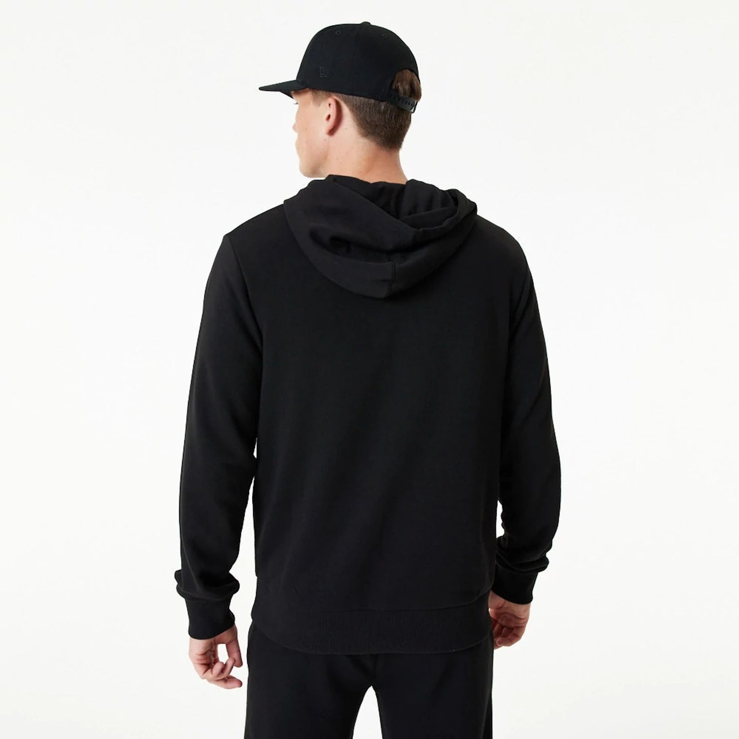 The Male model is wearing New Era Essential Black Pullover Hoodie 5