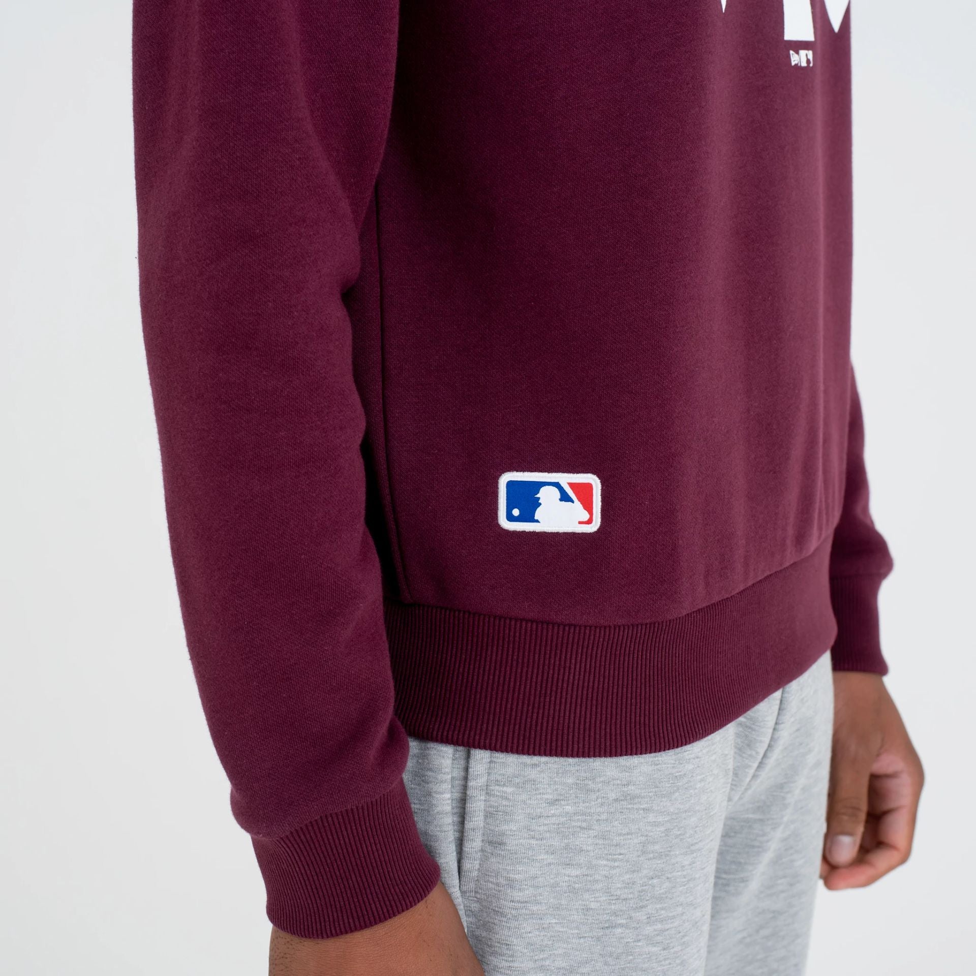 The Male model is wearing New York Yankees MLB Regular Dark Purple Crew Neck Sweatshirt 5