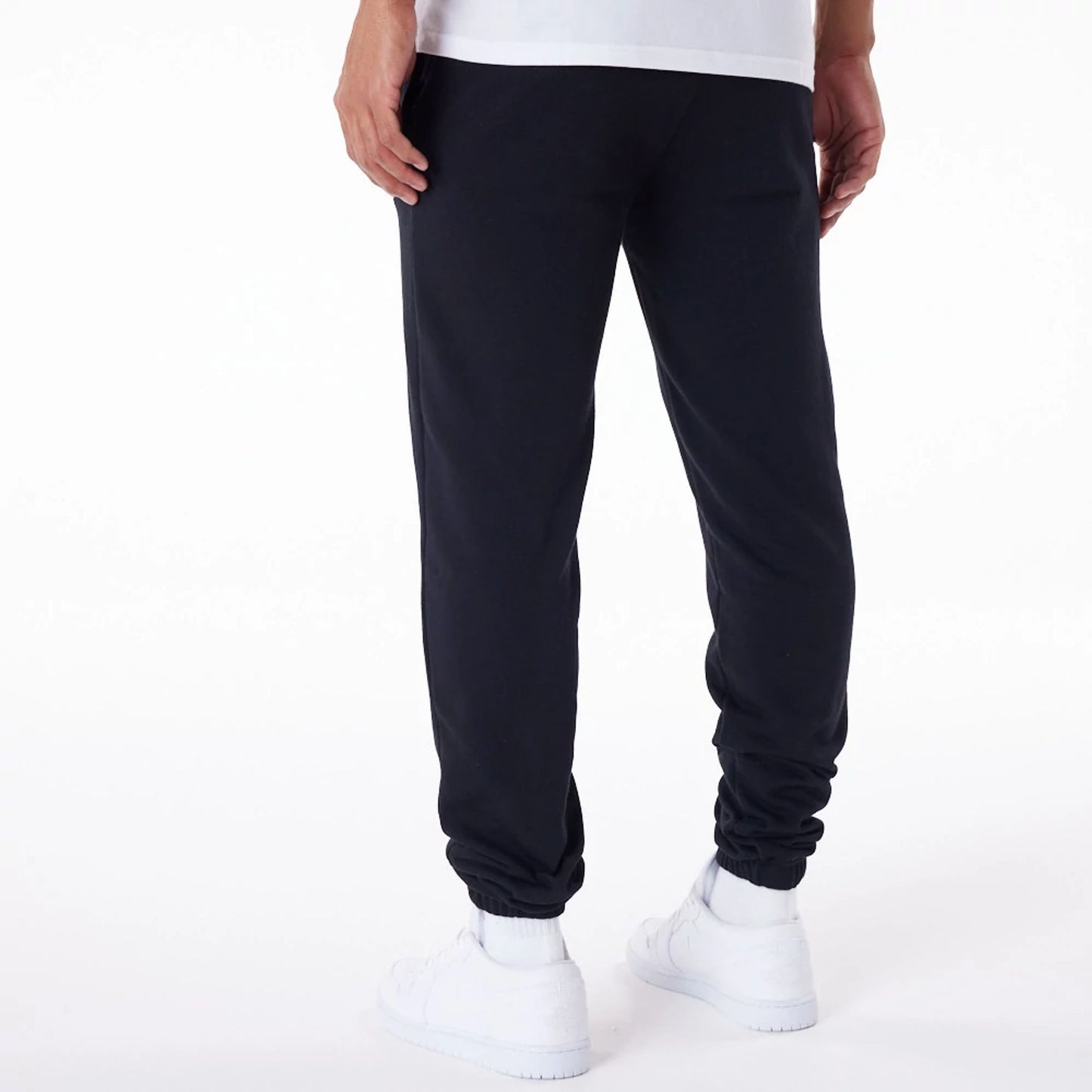 The Male model is wearing New Era Essential Black Joggers 7