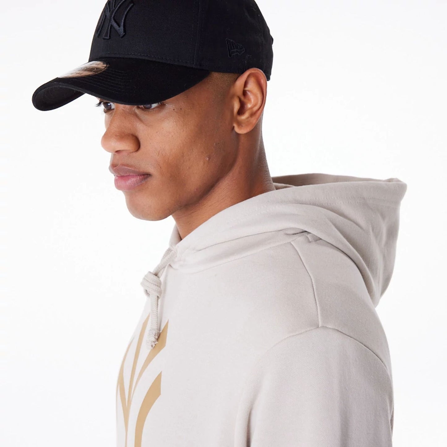 The Male model is wearing New York Yankees MLB Regular Light Beige Pullover Hoodie 3