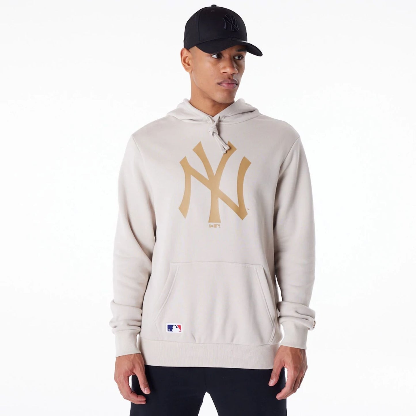 The Male model is wearing New York Yankees MLB Regular Light Beige Pullover Hoodie 1