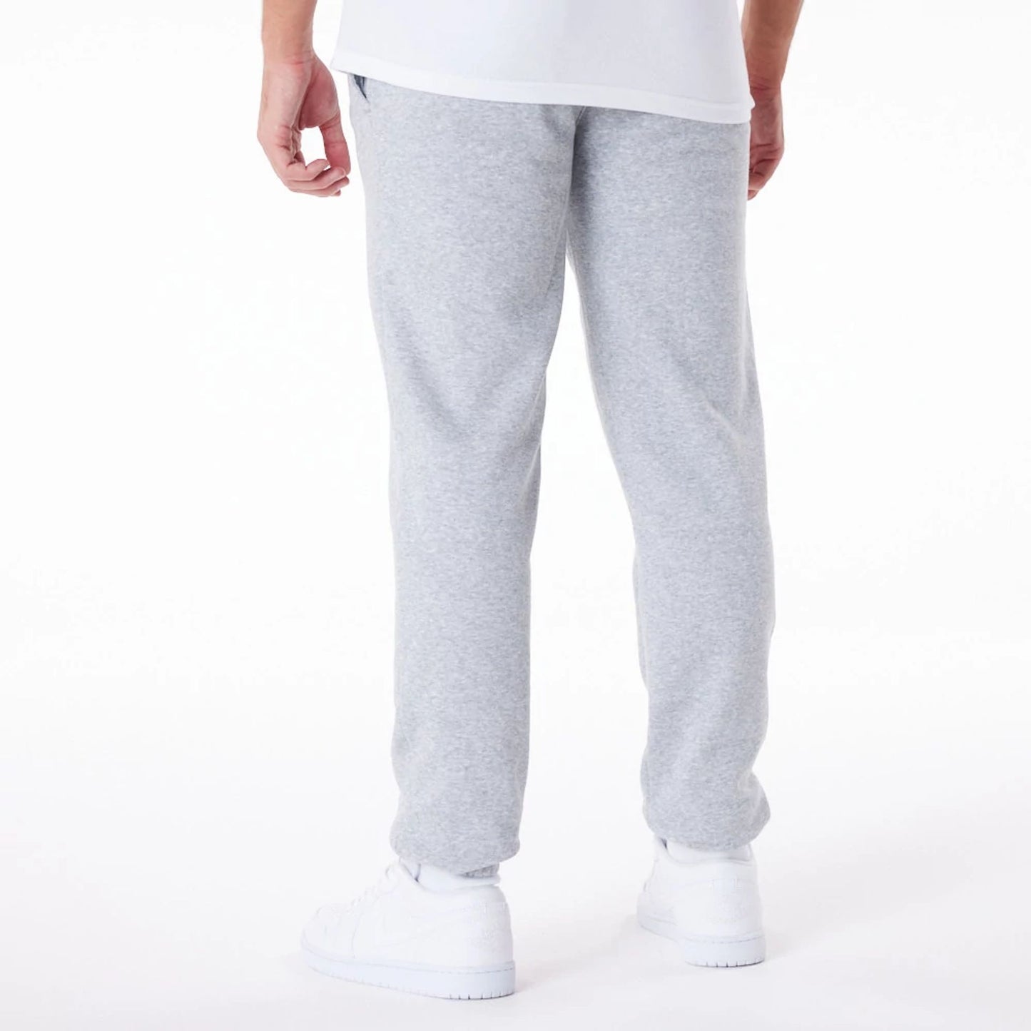 The Male model is wearing New Era Essential Grey Joggers 5