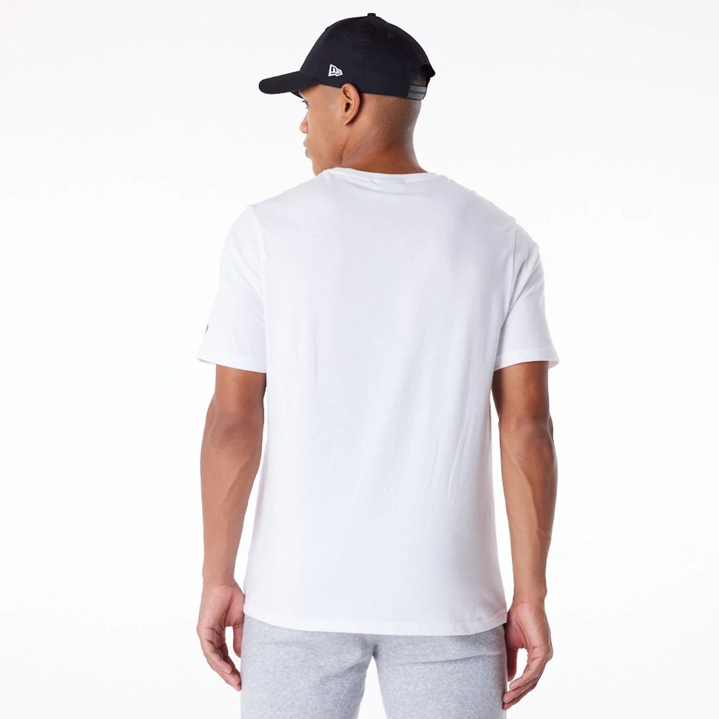 The Male model is wearing New Era Essential White T-Shirt 6