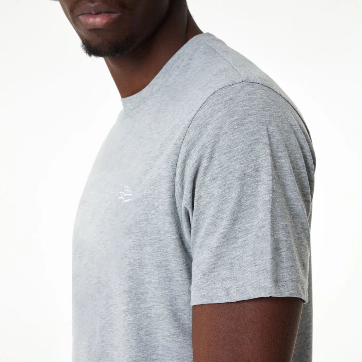 The Male model is wearing New Era Essential Grey T-Shirt 3