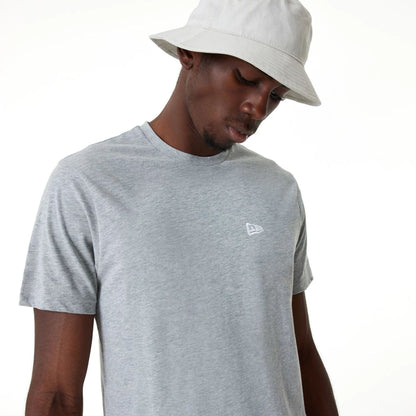 The Male model is wearing New Era Essential Grey T-Shirt 4