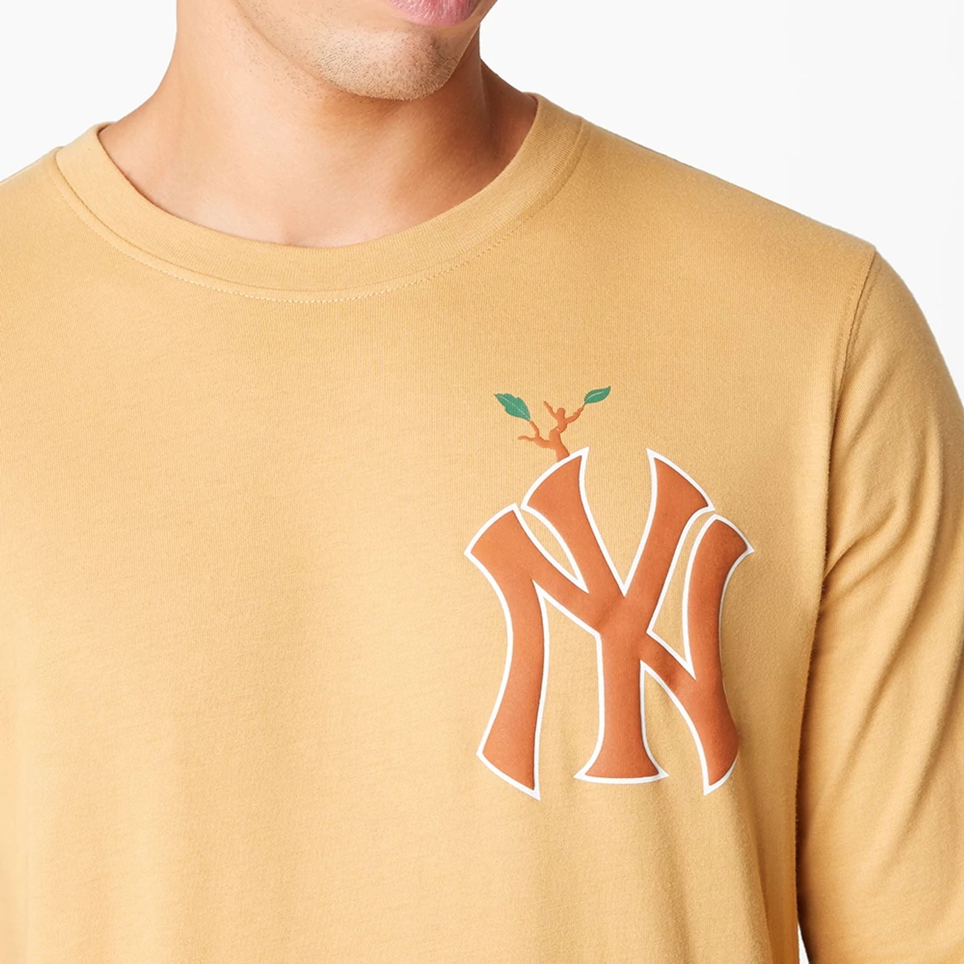 The Male model is wearing New York Yankees Camp Beige Long Sleeve T-Shirt 2