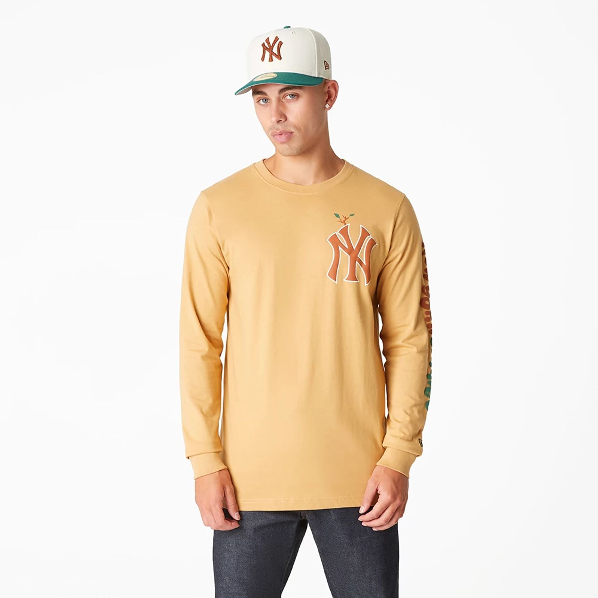 The Male model is wearing New York Yankees Camp Beige Long Sleeve T-Shirt 1