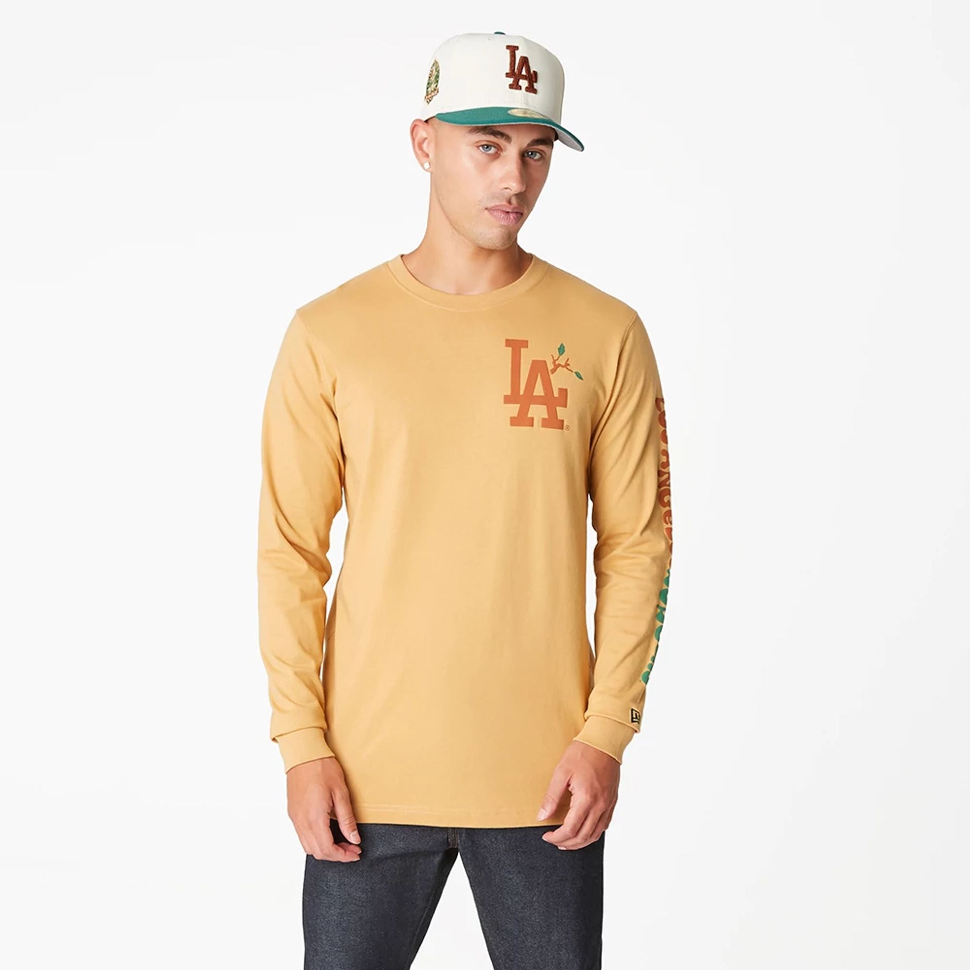 The Male model is wearing LA Dodgers Camp Beige Long Sleeve T-Shirt 1