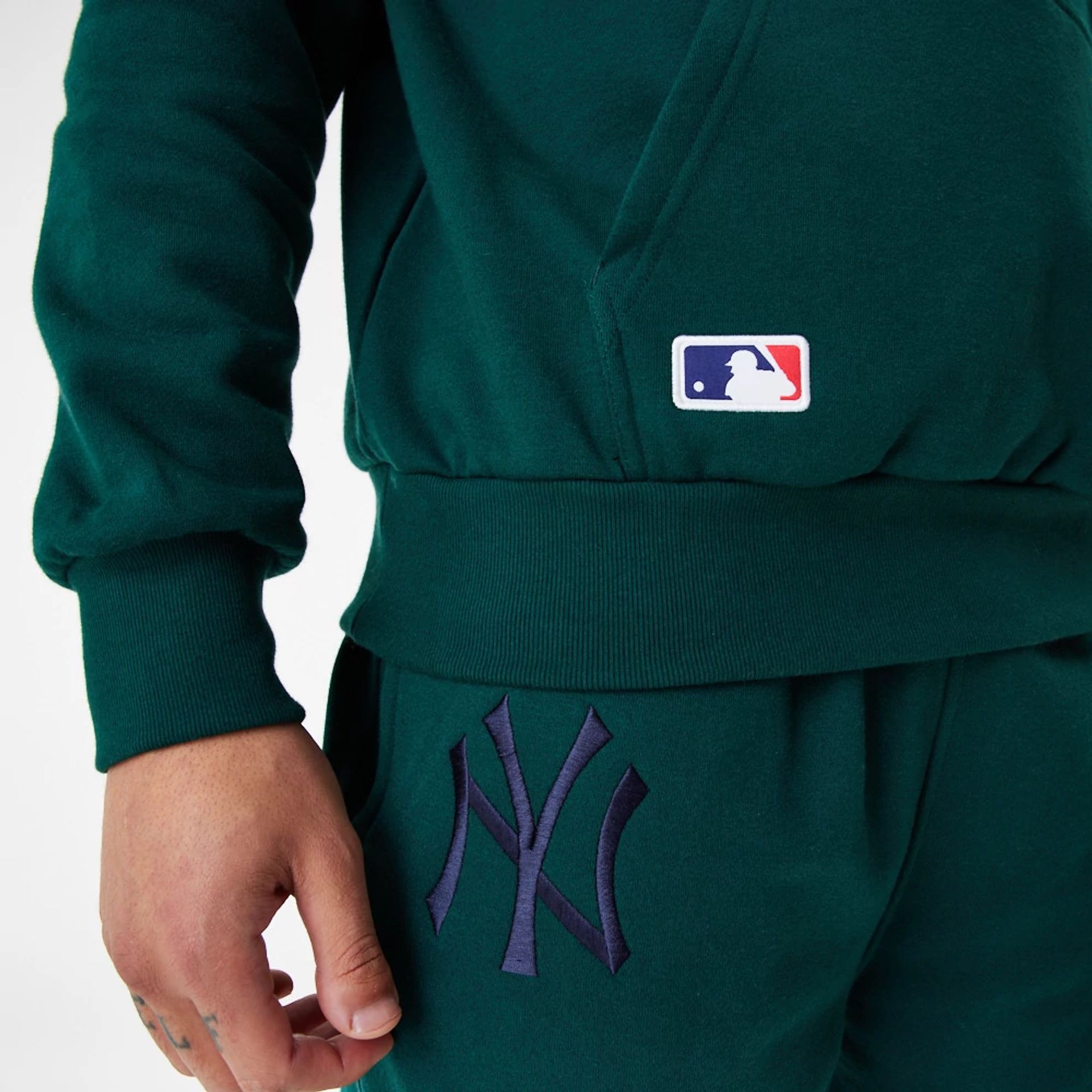 The Male model is wearing New York Yankees League Essential Green Oversized Hoodie 2