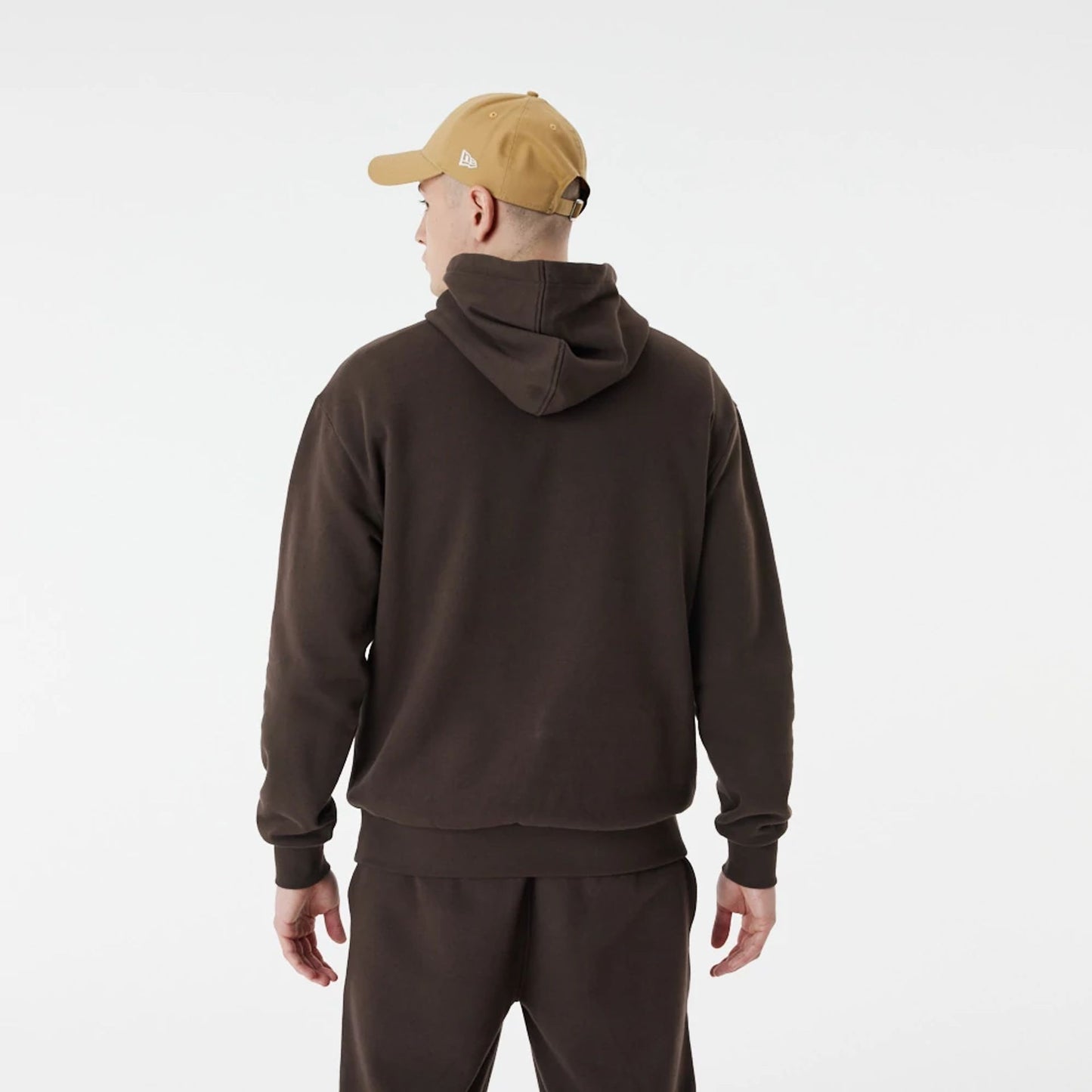 The Male model is wearing LA Dodgers League Essential Brown Oversized Hoodie 7