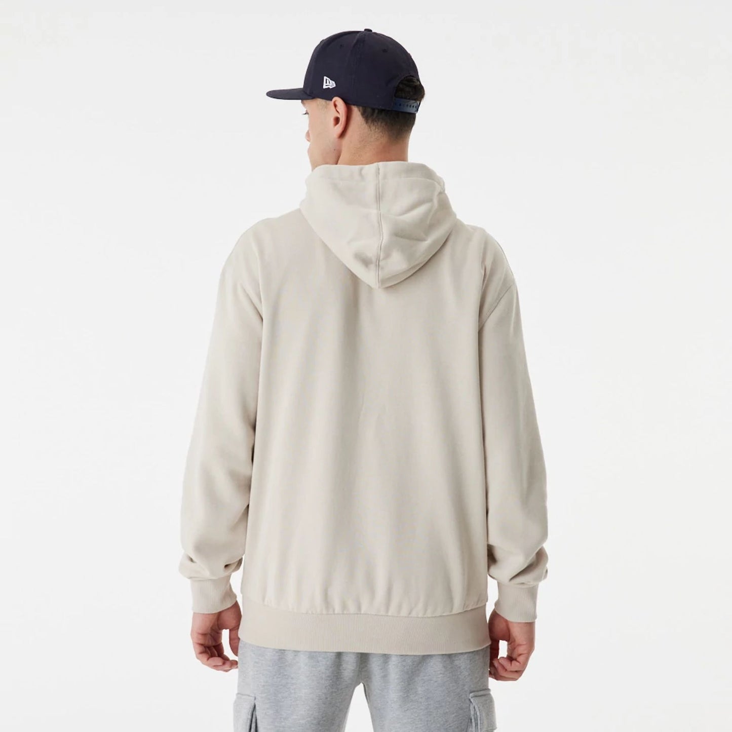 The Male model is wearing New York Yankees MLB Team Retro Graphic Light Beige Oversized Hoodie 6