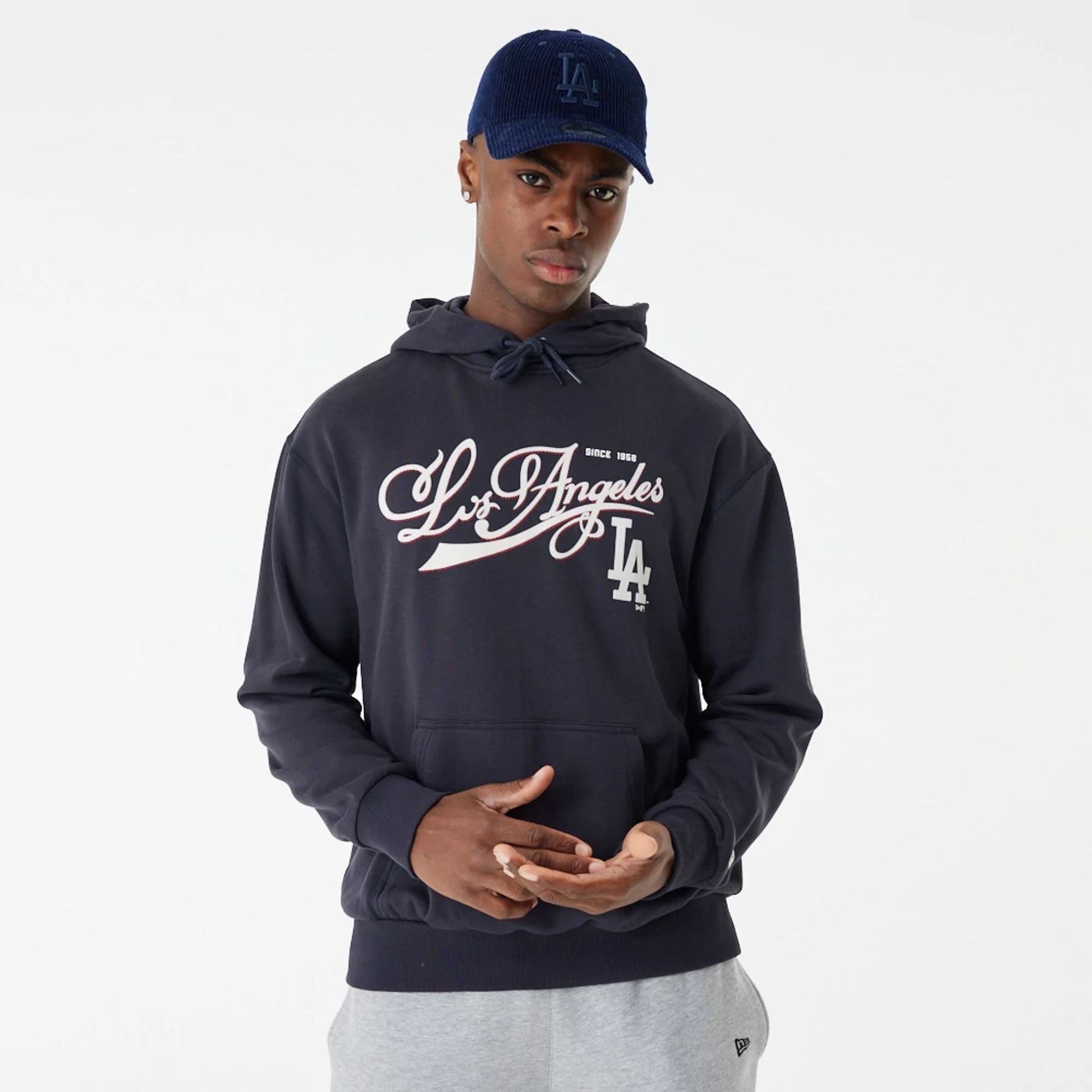 The Male model is wearing LA Dodgers MLB Team Retro Graphic Navy Oversized Hoodie 1