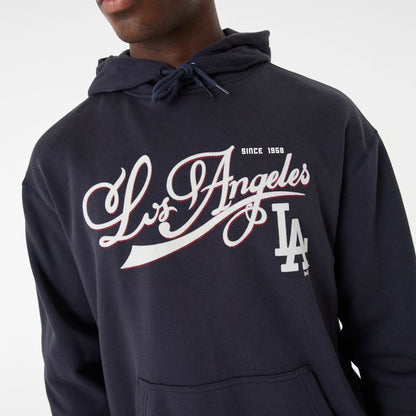 The Male model is wearing LA Dodgers MLB Team Retro Graphic Navy Oversized Hoodie 5