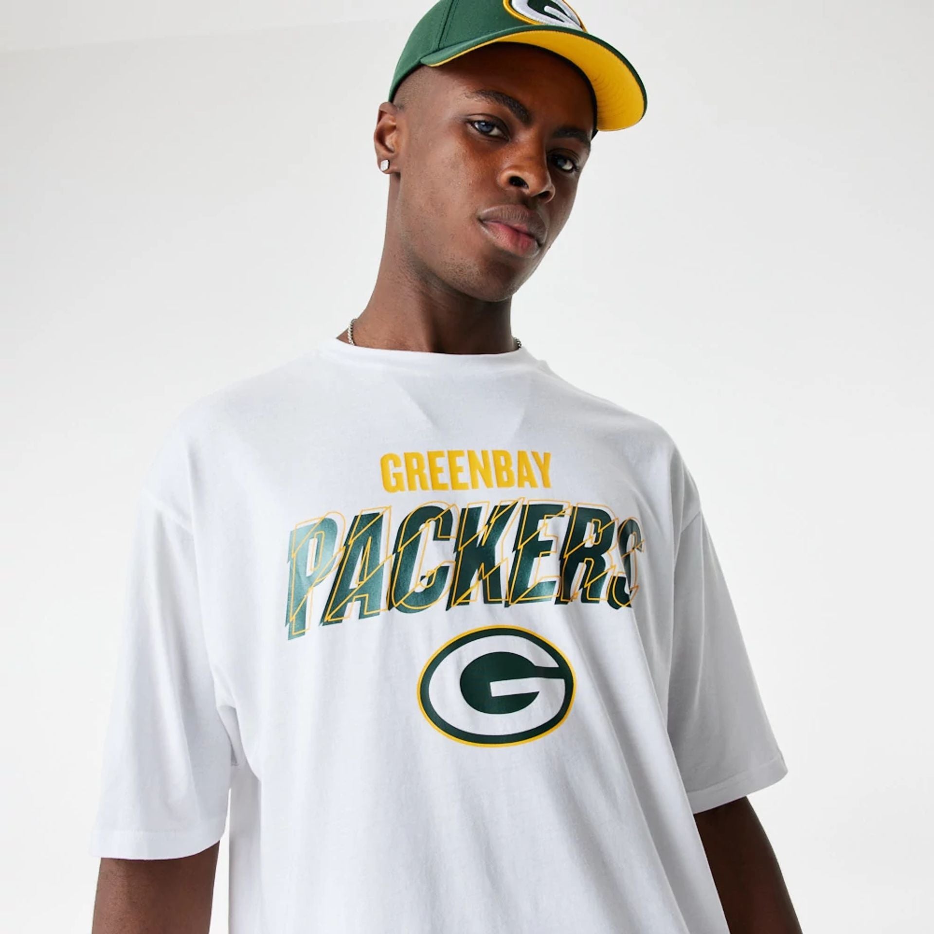 The Male model is wearing Green Bay Packers NFL Script Graphic White Oversized T-Shirt 6