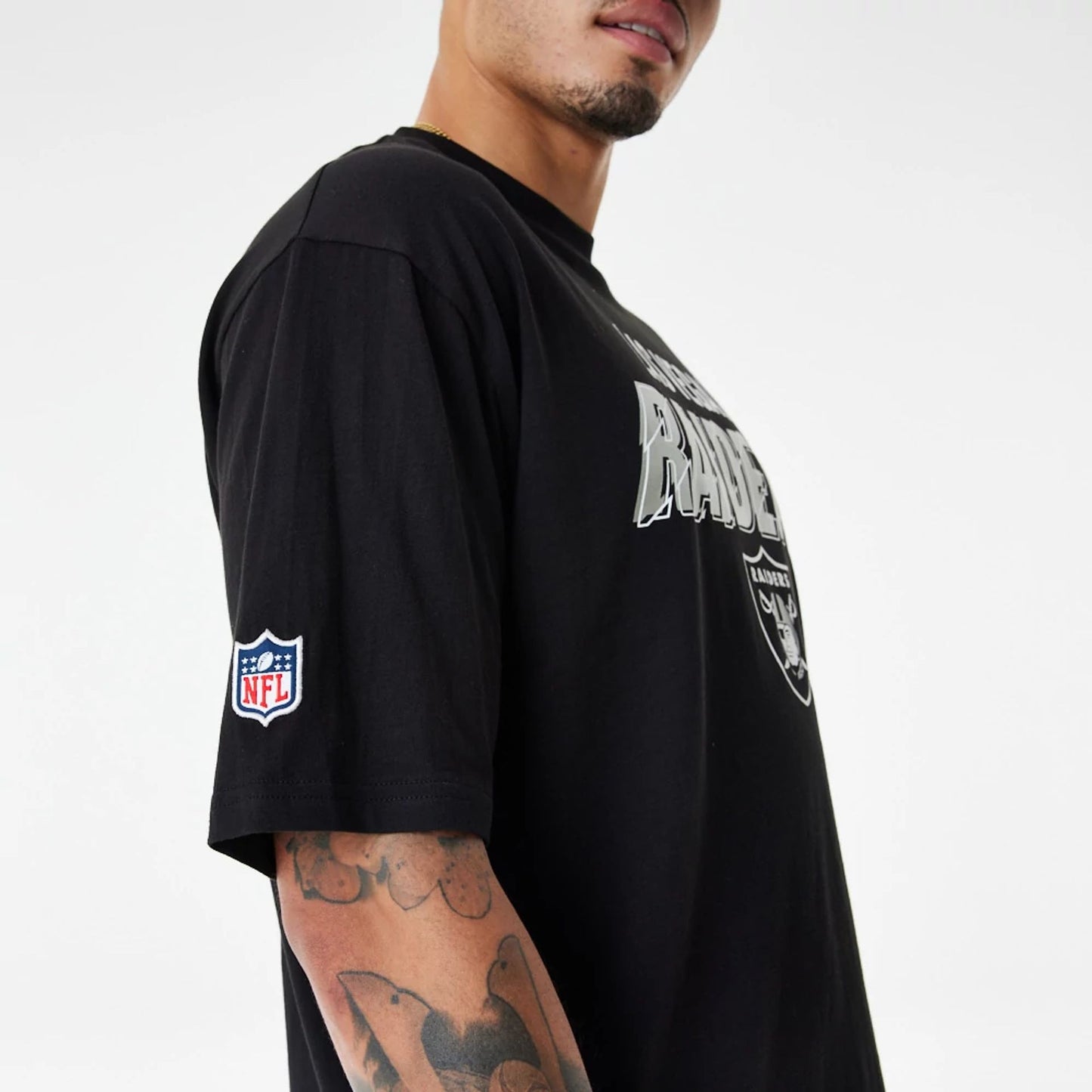 The Male model is wearing Las Vegas Raiders NFL Script Graphic Black Oversized T-Shirt 4