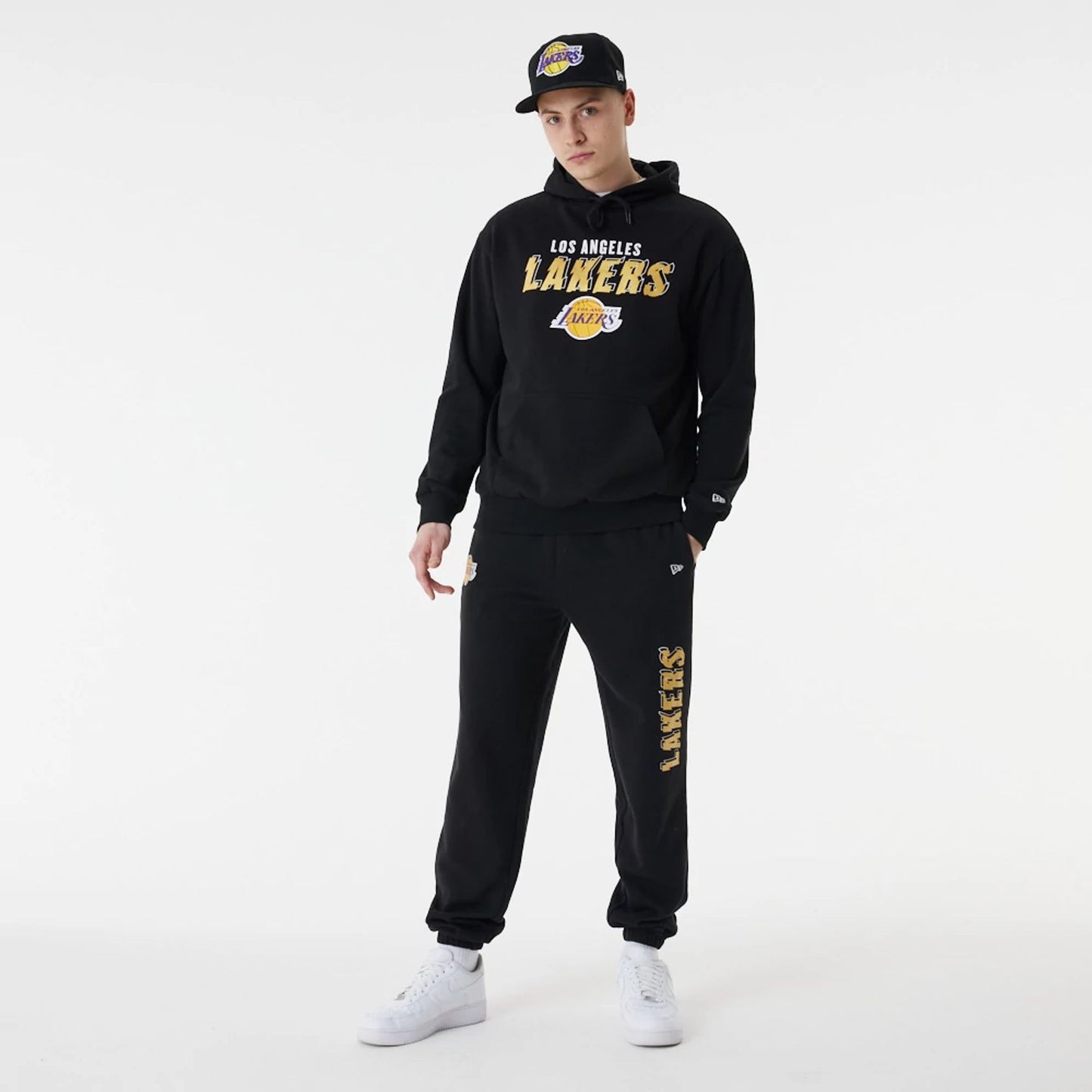 The Male model is wearing LA Lakers Team Script Black Oversized Hoodie 3