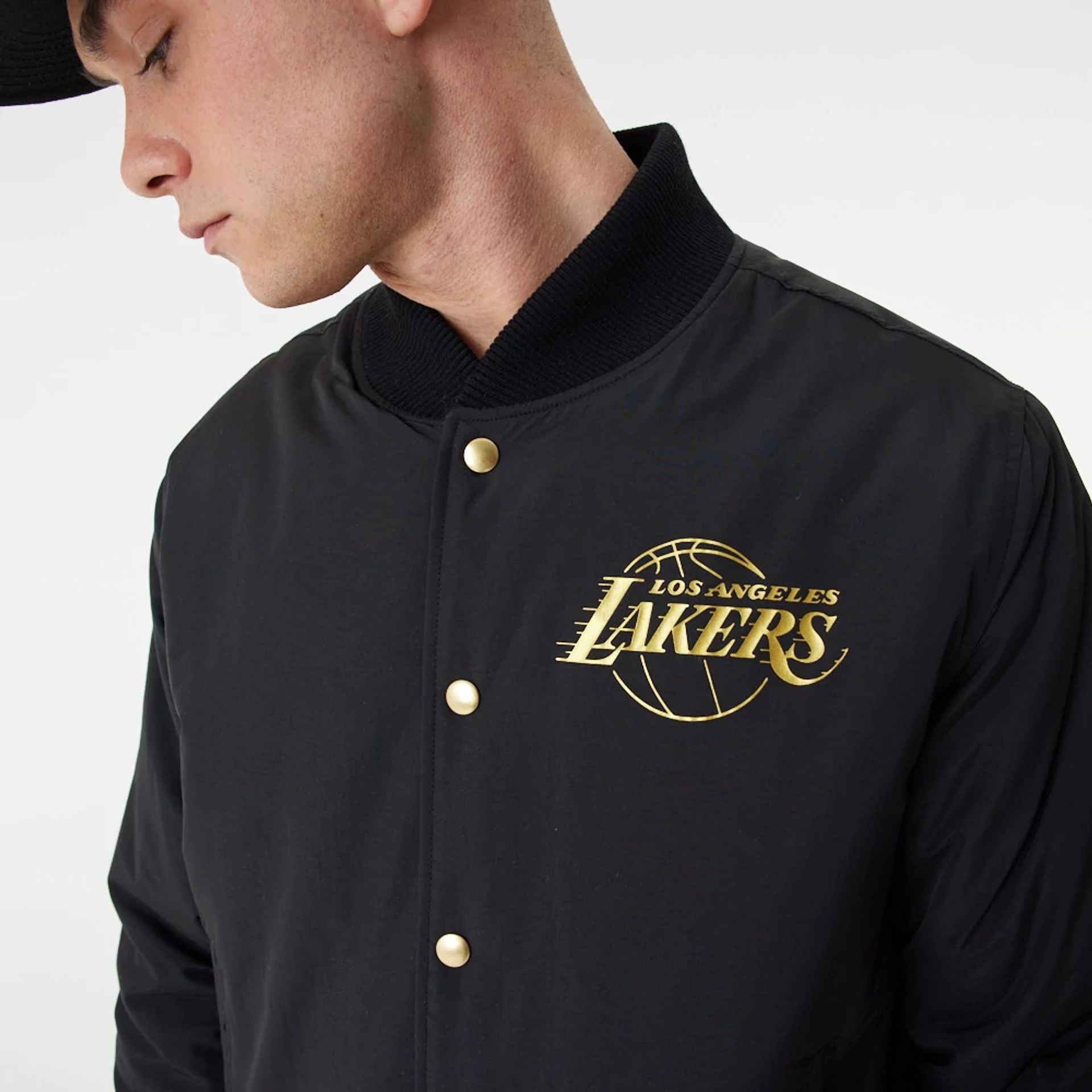 The Male model is wearing LA Lakers Gold Team Script Black Bomber Jacket 6