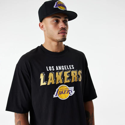 The Male model is wearing LA Lakers Team Script Black Oversized T-Shirt 5