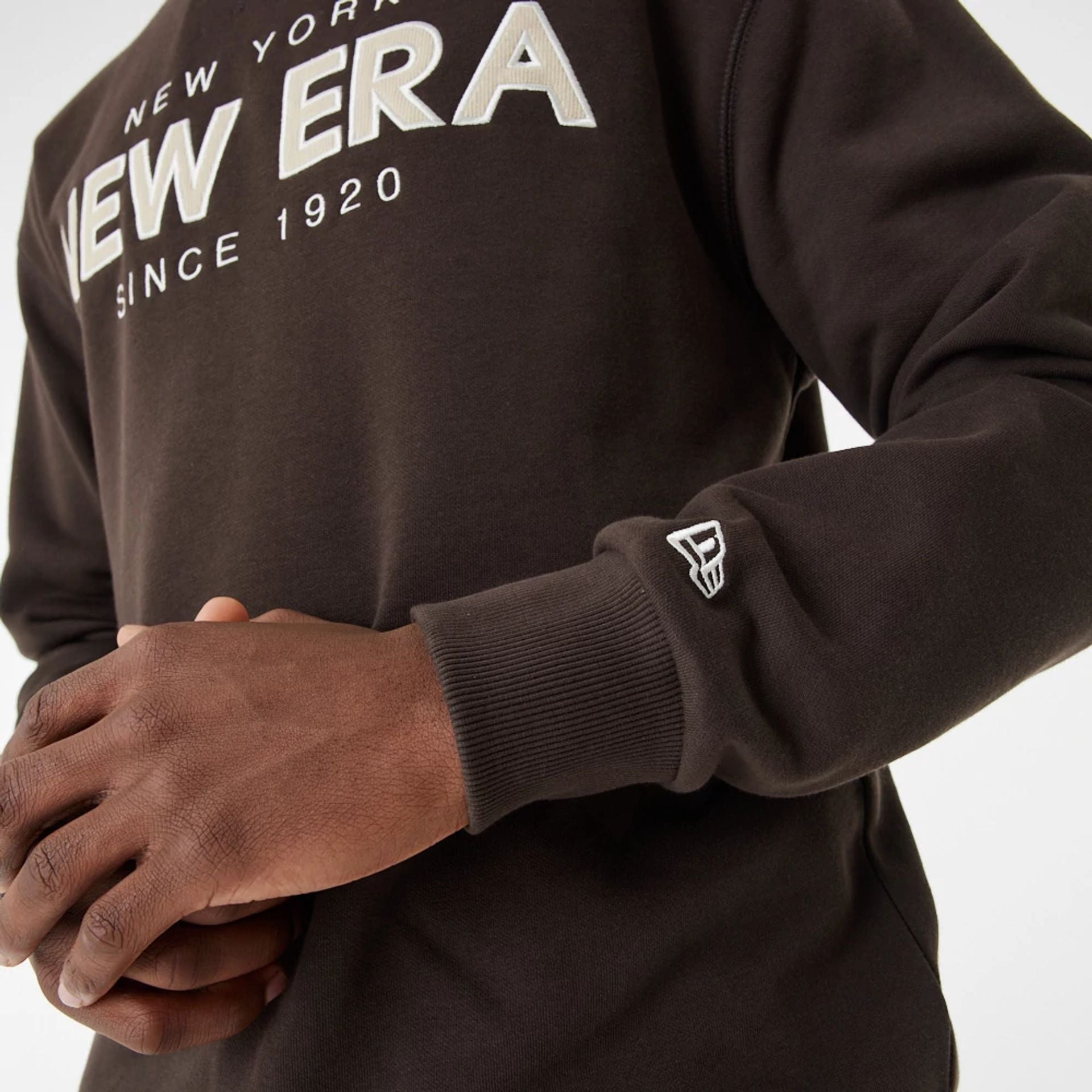 The Male model is wearing New Era Heritage Brown Crew Neck Sweatshirt 3