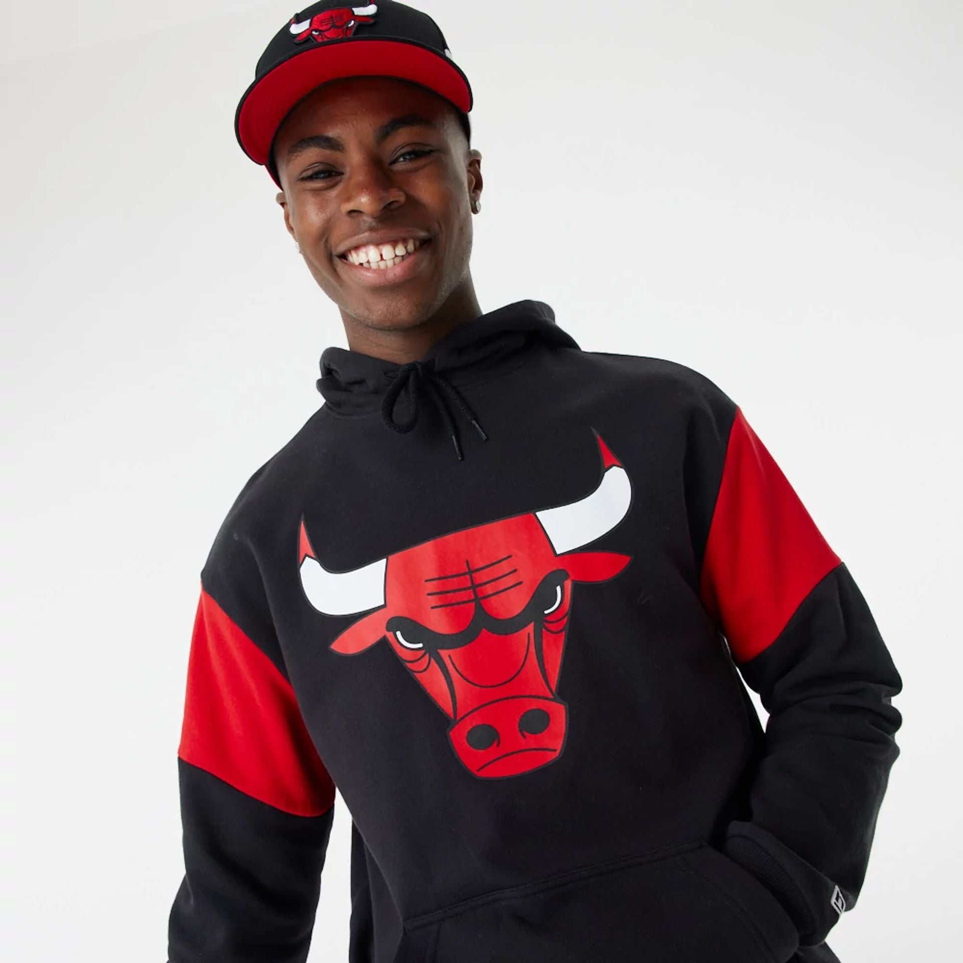 The Male model is wearing Chicago Bulls NBA Colour Block Black Oversized Hoodie 1