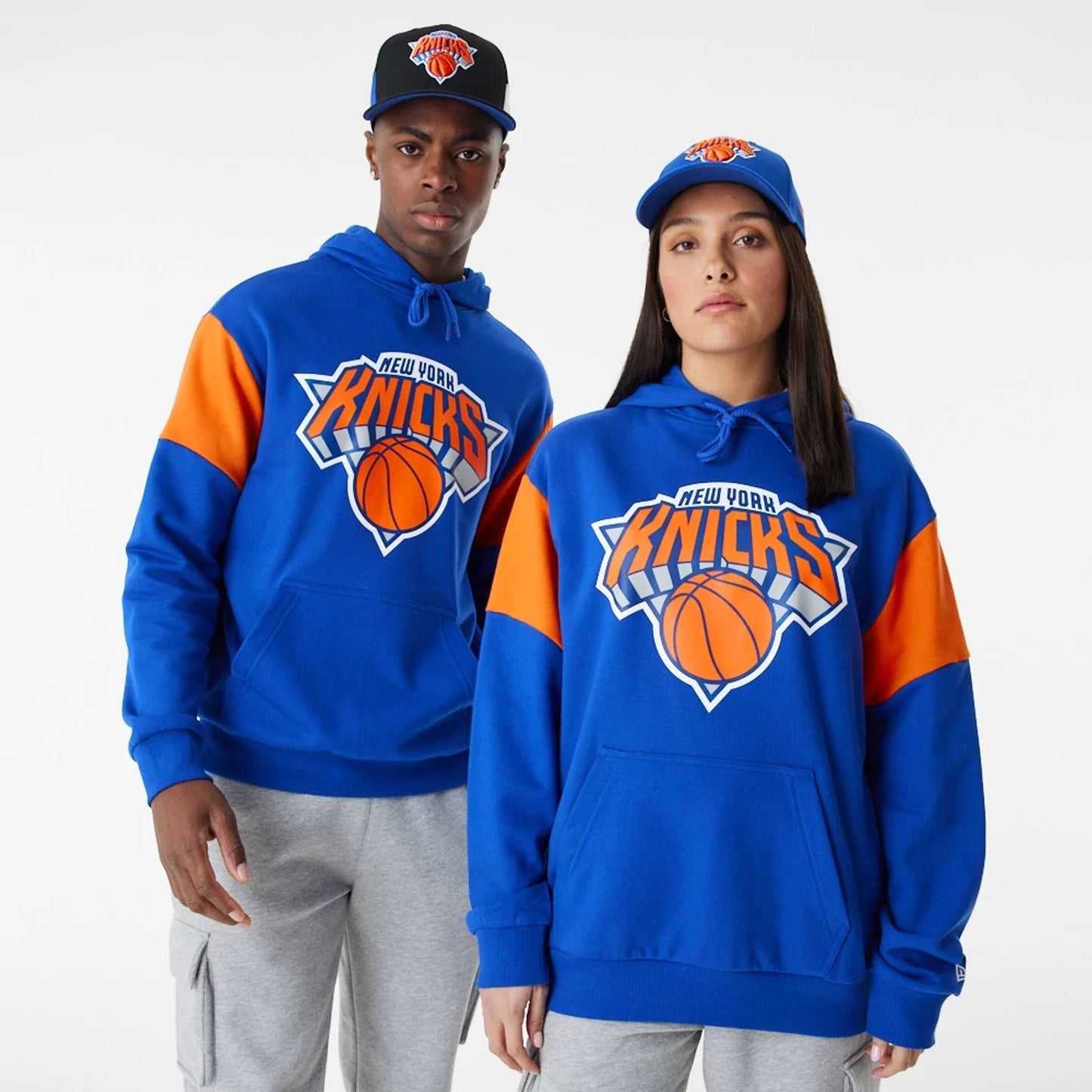 The Male model is wearing New York Knicks NBA Colour Block Blue Oversized Hoodie 2