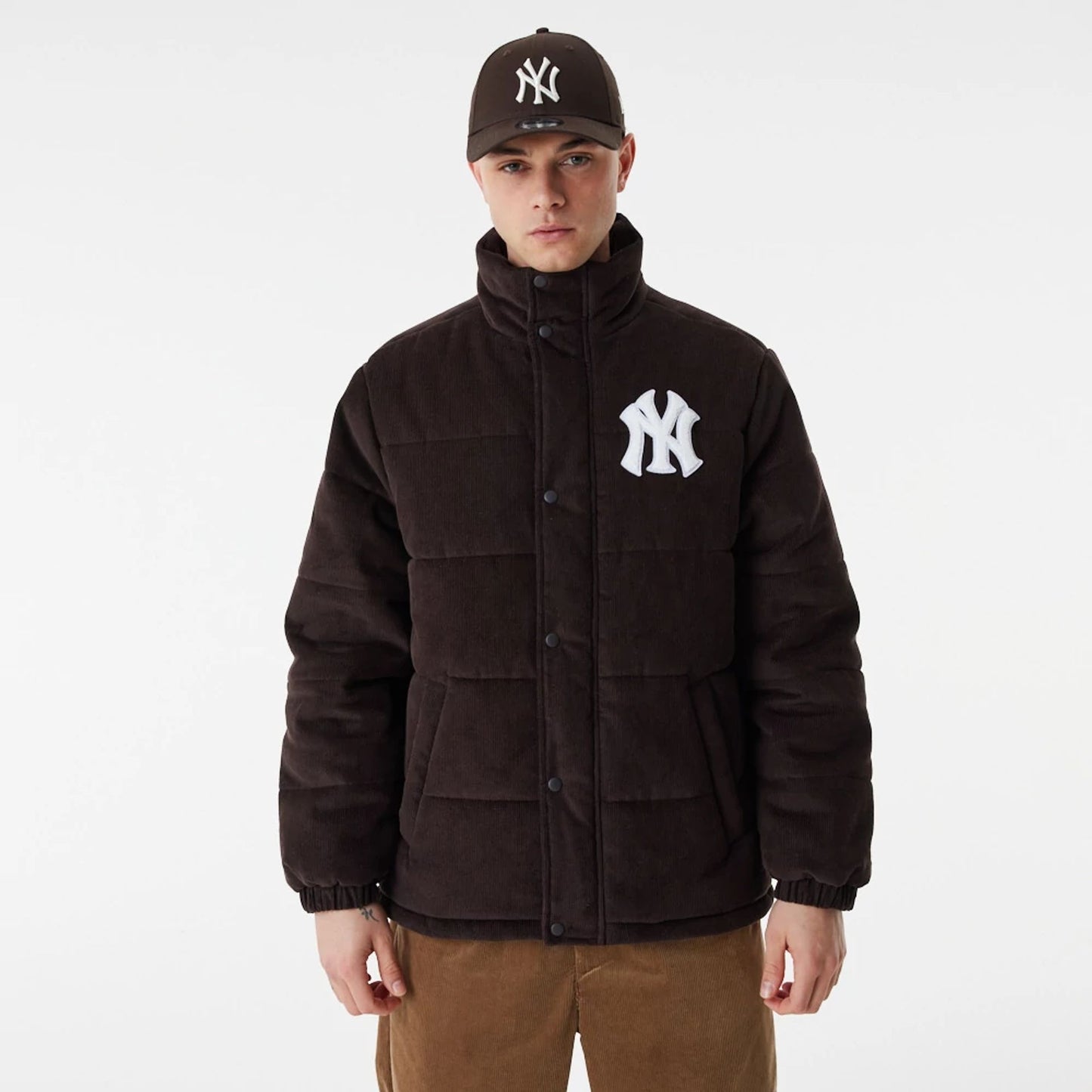 The Male model is wearing New York Yankees MLB Brown Puffer Jacket 3