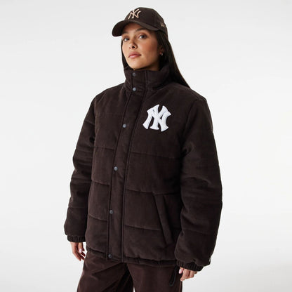 The Male model is wearing New York Yankees MLB Brown Puffer Jacket 2