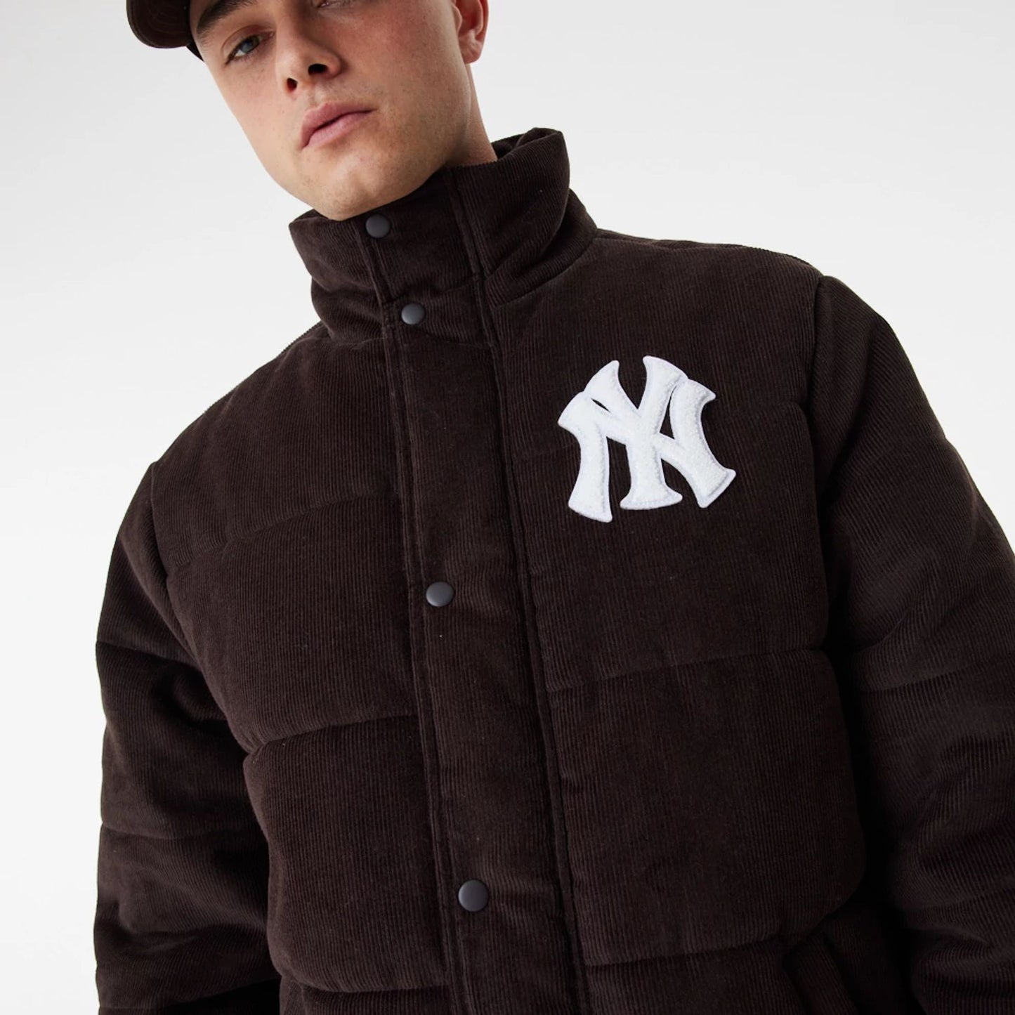 The Male model is wearing New York Yankees MLB Brown Puffer Jacket 9