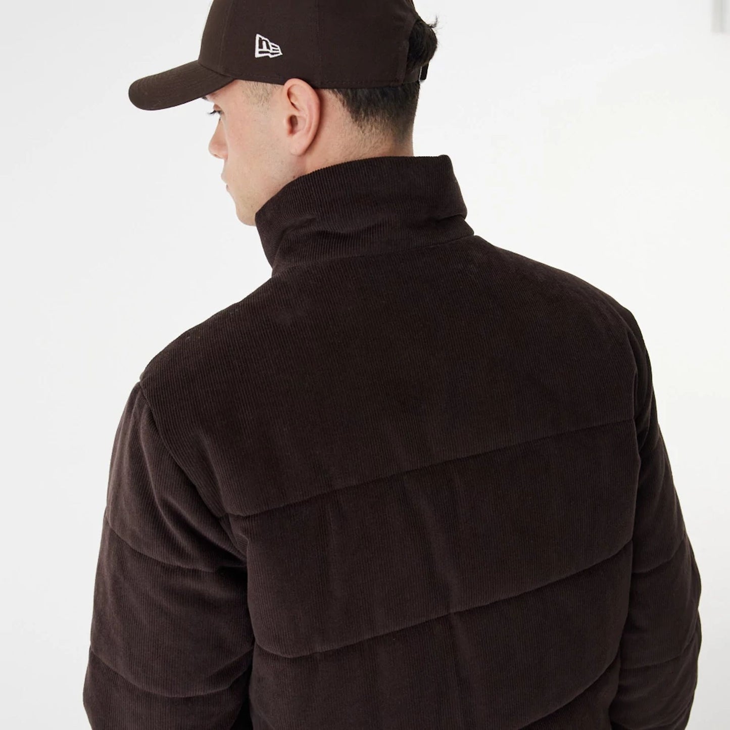 The Male model is wearing New York Yankees MLB Brown Puffer Jacket 11