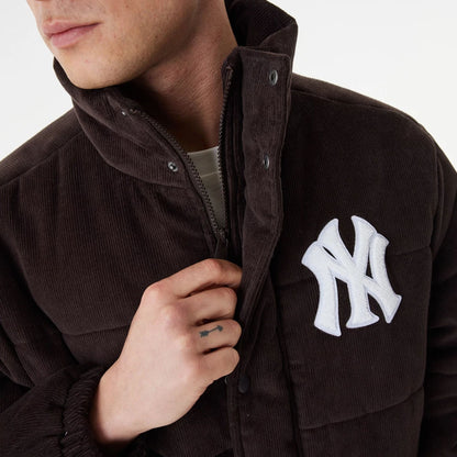 The Male model is wearing New York Yankees MLB Brown Puffer Jacket 4