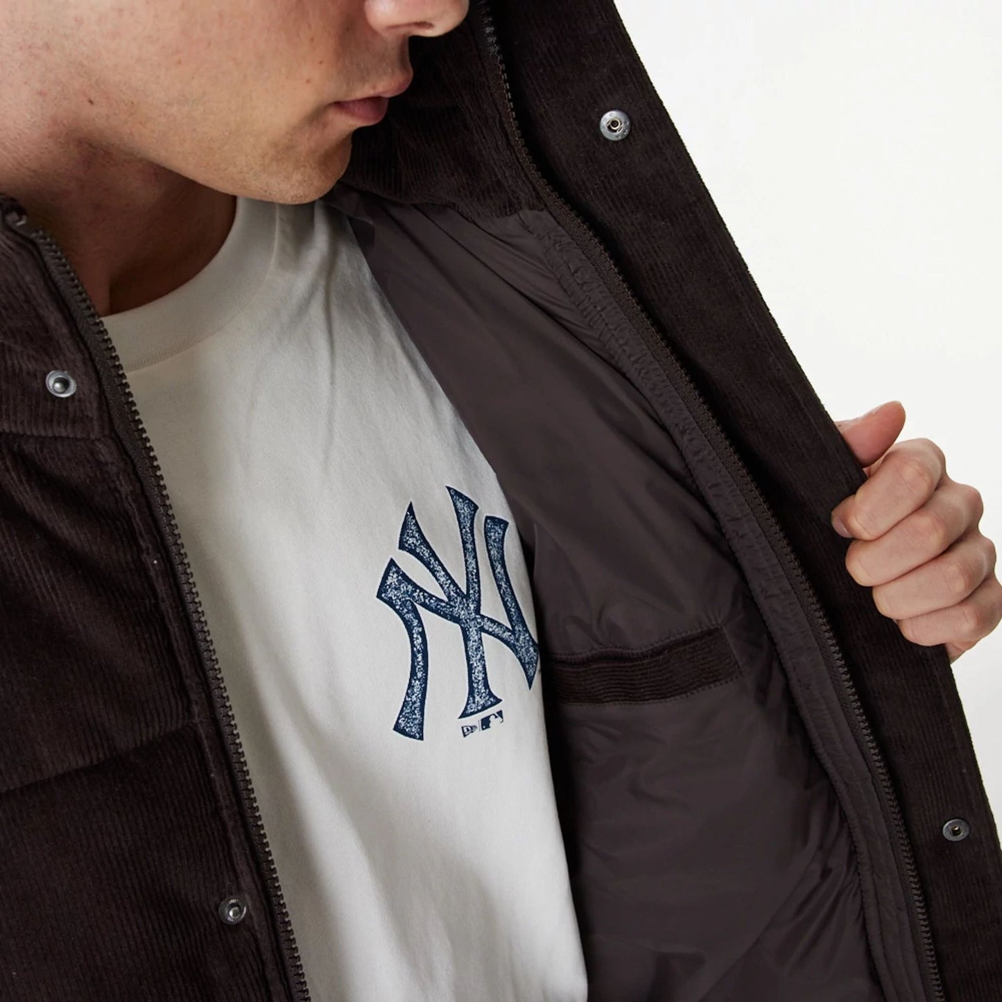 The Male model is wearing New York Yankees MLB Brown Puffer Jacket 6