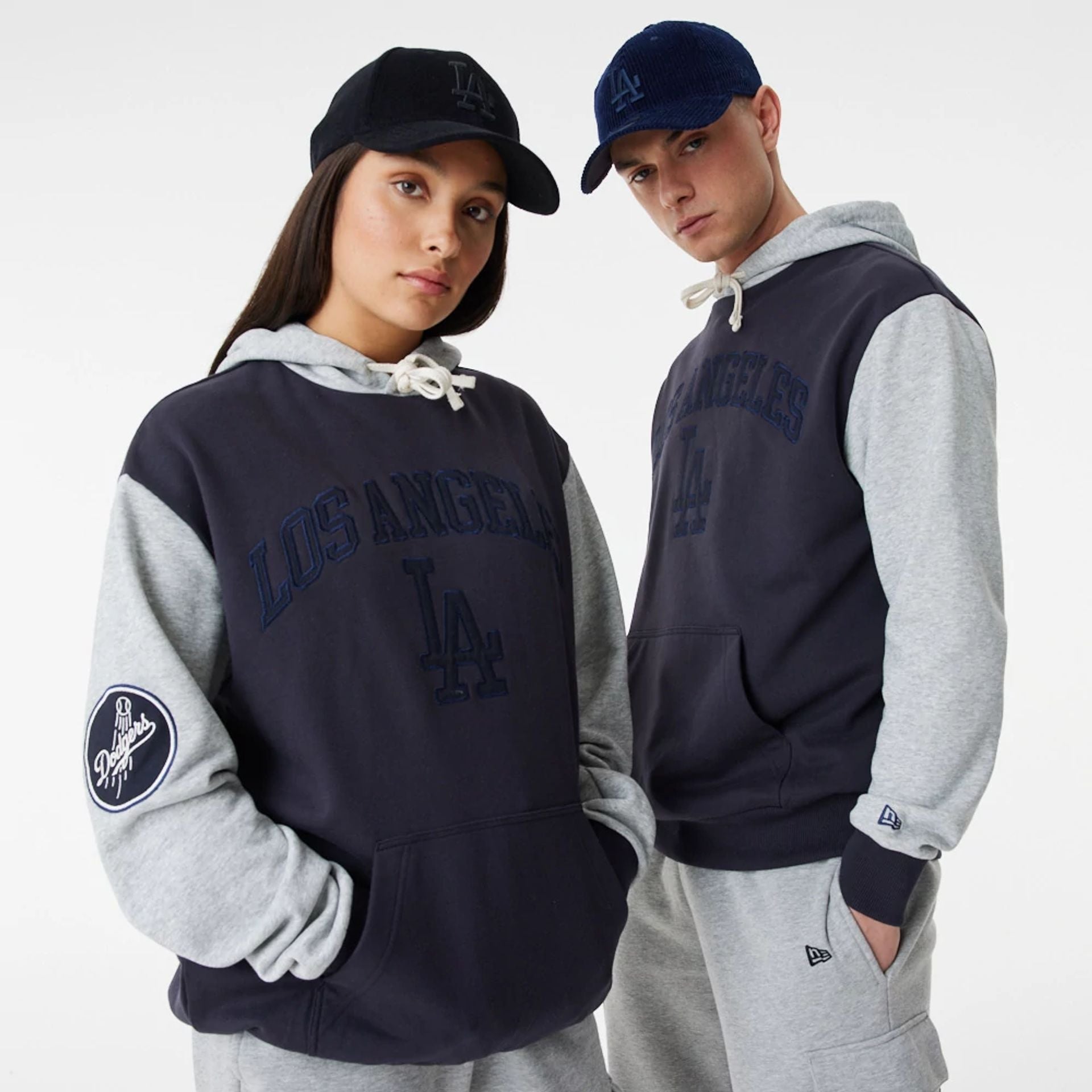 The Male model is wearing LA Dodgers MLB Heritage Navy Oversized Hoodie 1