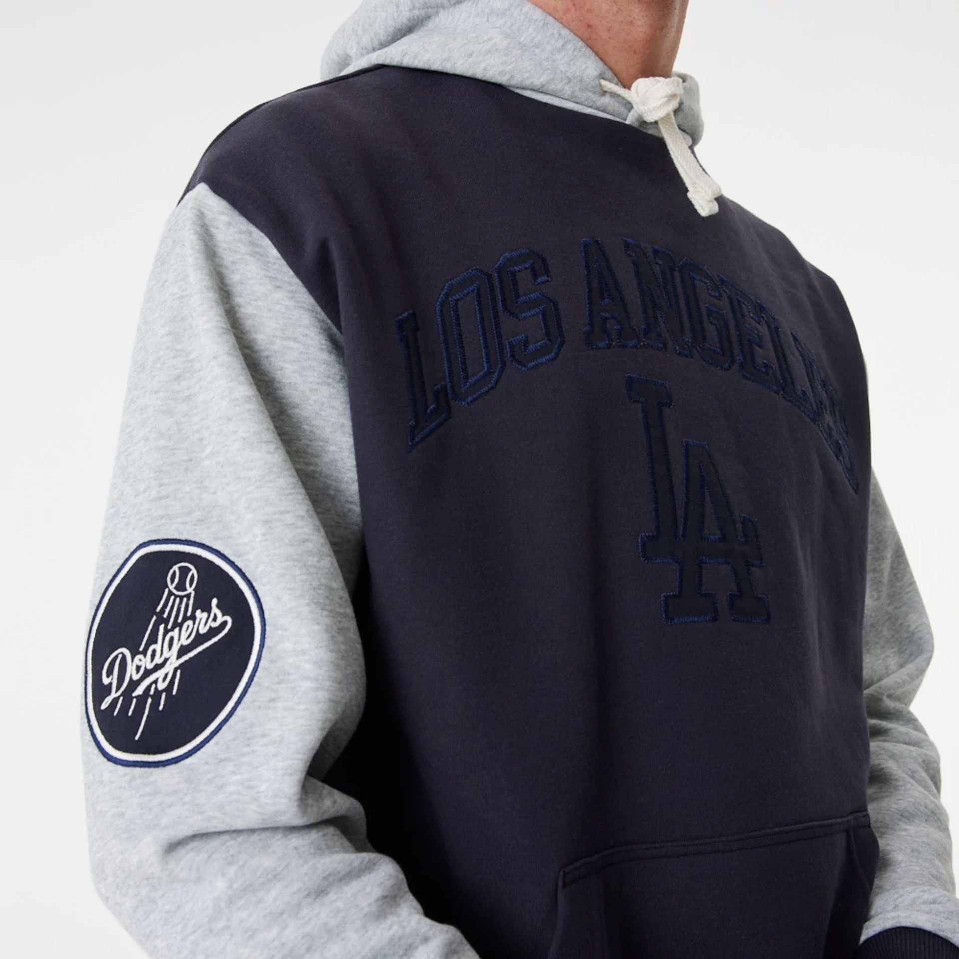 The Male model is wearing LA Dodgers MLB Heritage Navy Oversized Hoodie 2