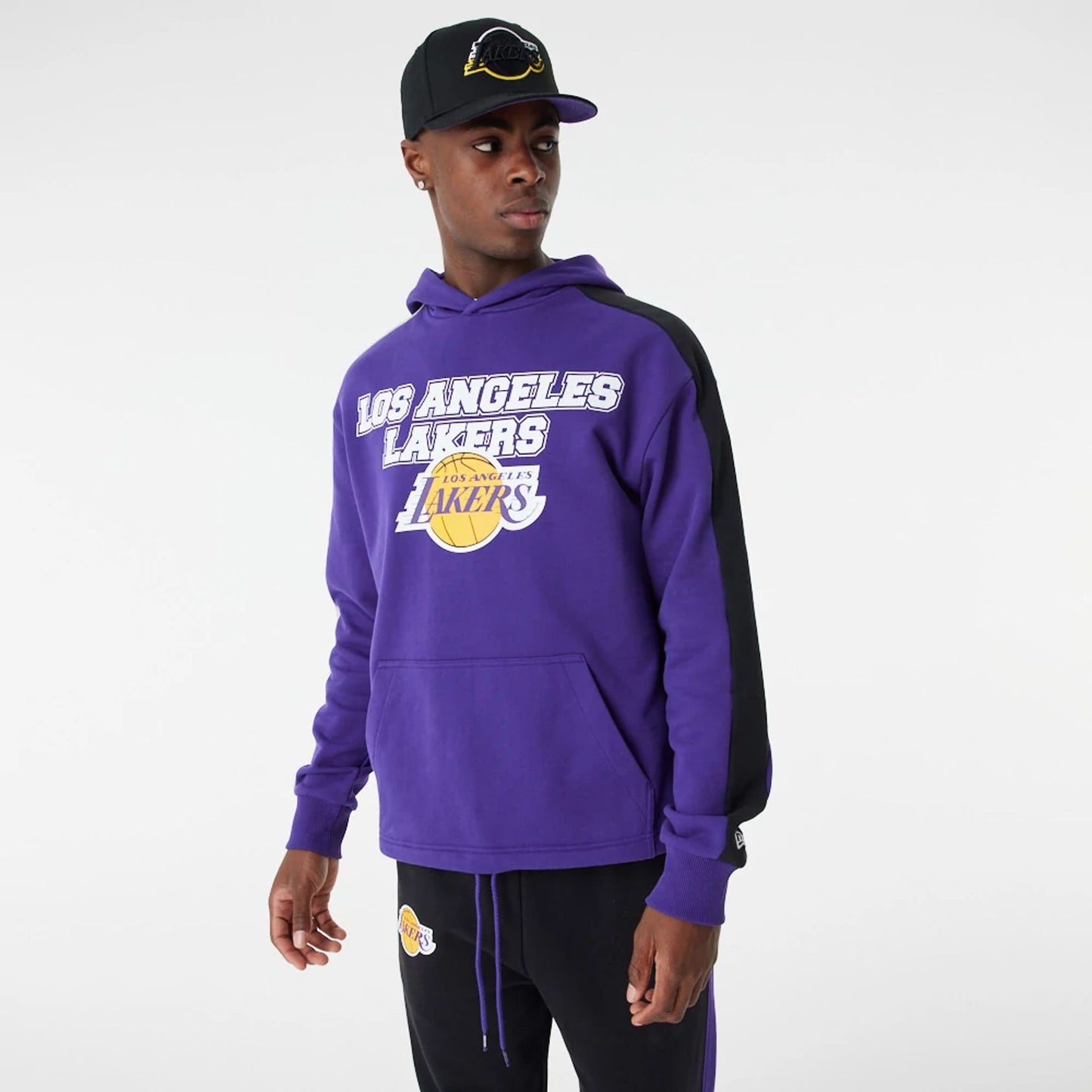 The Male model is wearing LA Lakers NBA Large Graphic Purple Oversized Hoodie 10