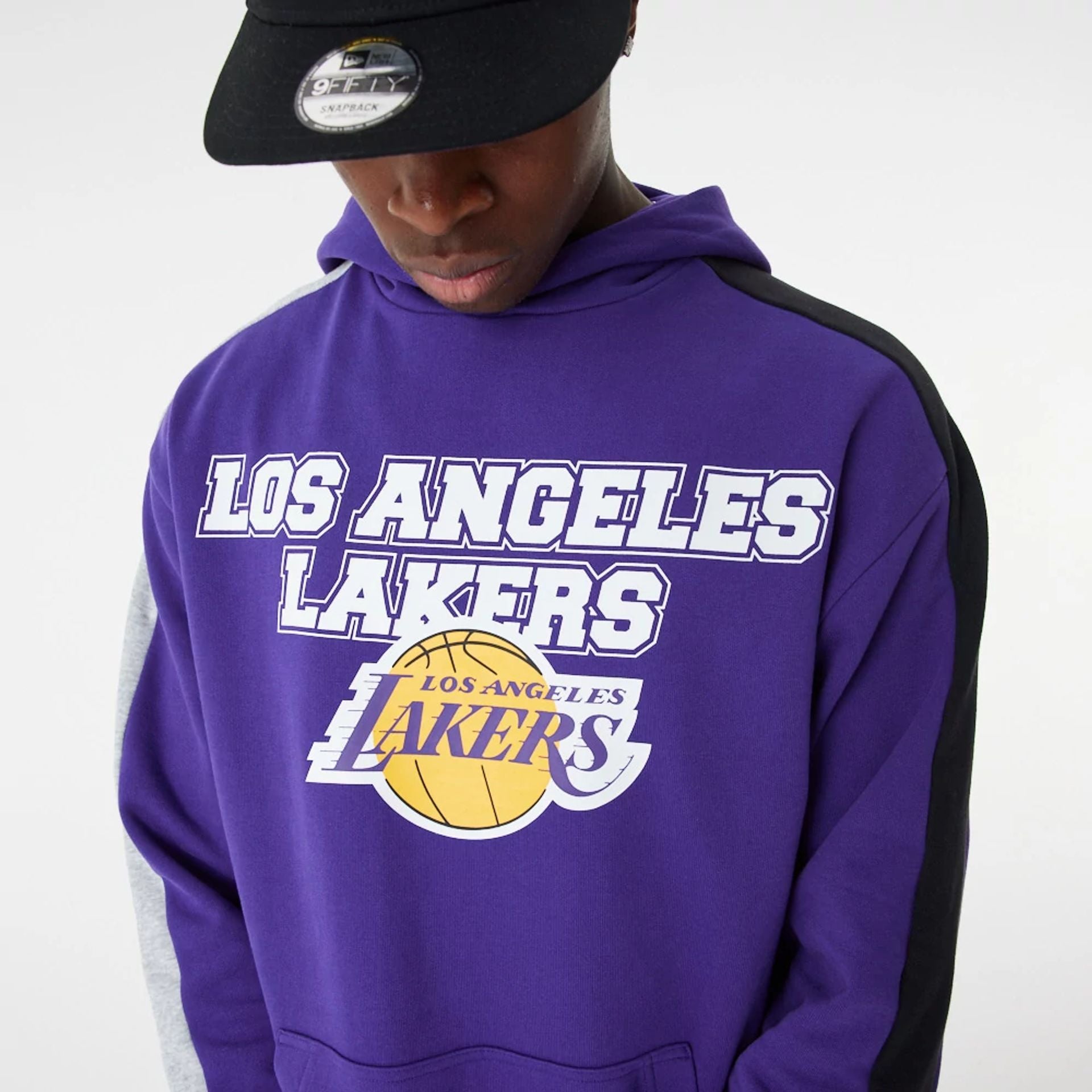 The Male model is wearing LA Lakers NBA Large Graphic Purple Oversized Hoodie 8