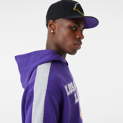 The Male model is wearing LA Lakers NBA Large Graphic Purple Oversized Hoodie 6