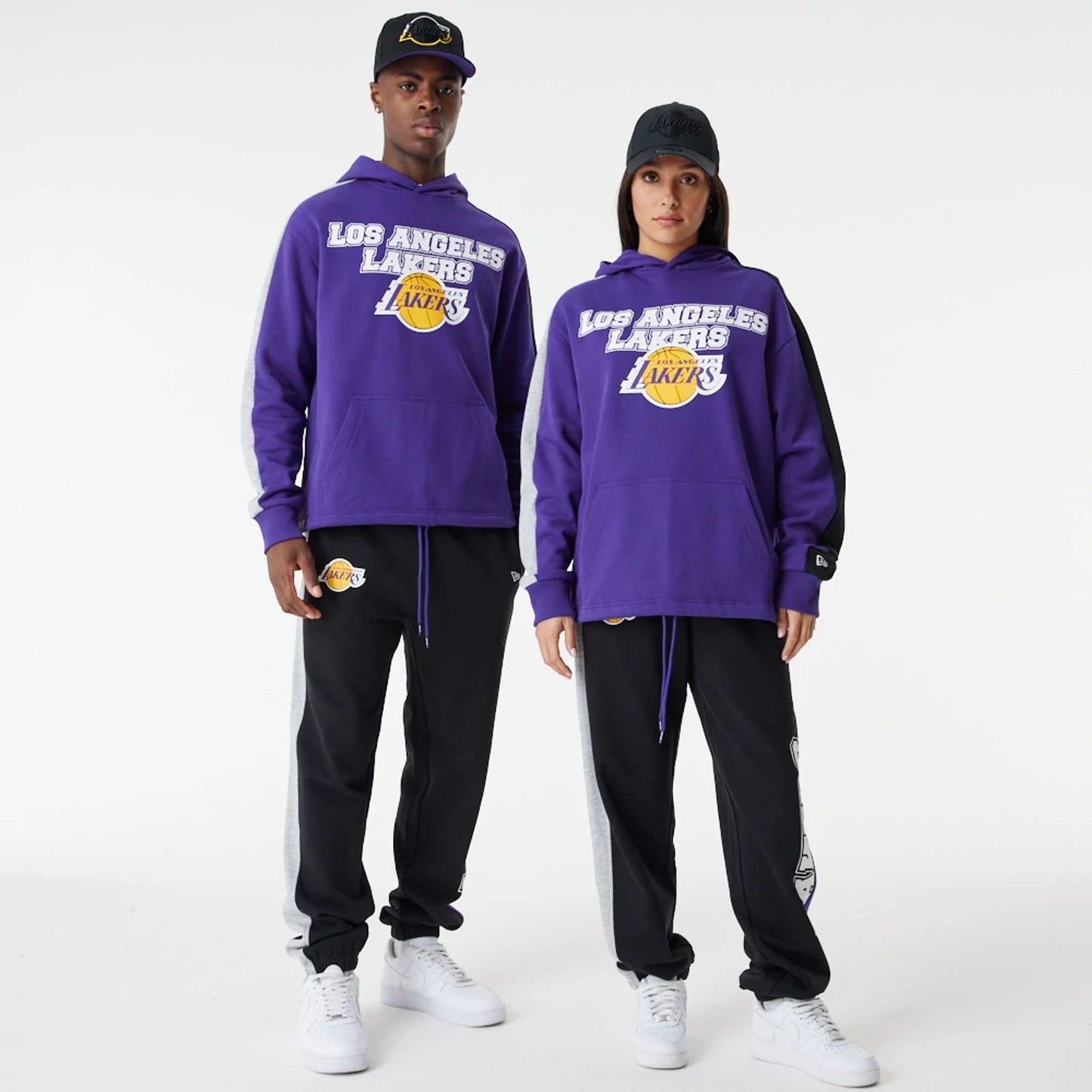 The Male model is wearing LA Lakers NBA Large Graphic Purple Oversized Hoodie 5