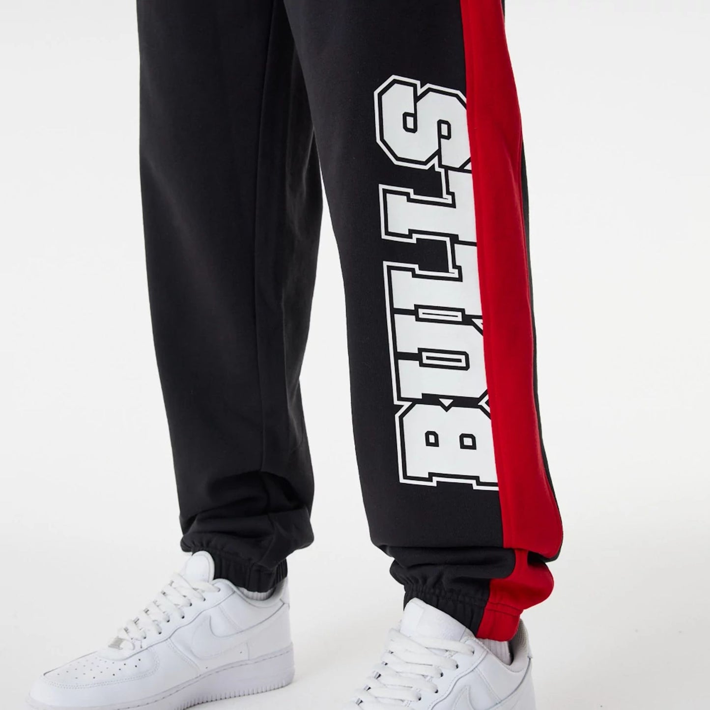 The Male model is wearing Chicago Bulls NBA Large Graphic Black Joggers 5