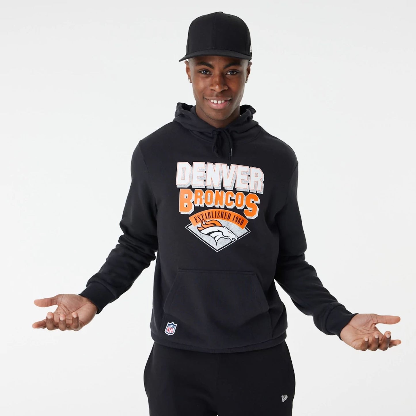 The Male model is wearing Denver Broncos NFL Team Graphic Black Pullover Hoodie 5