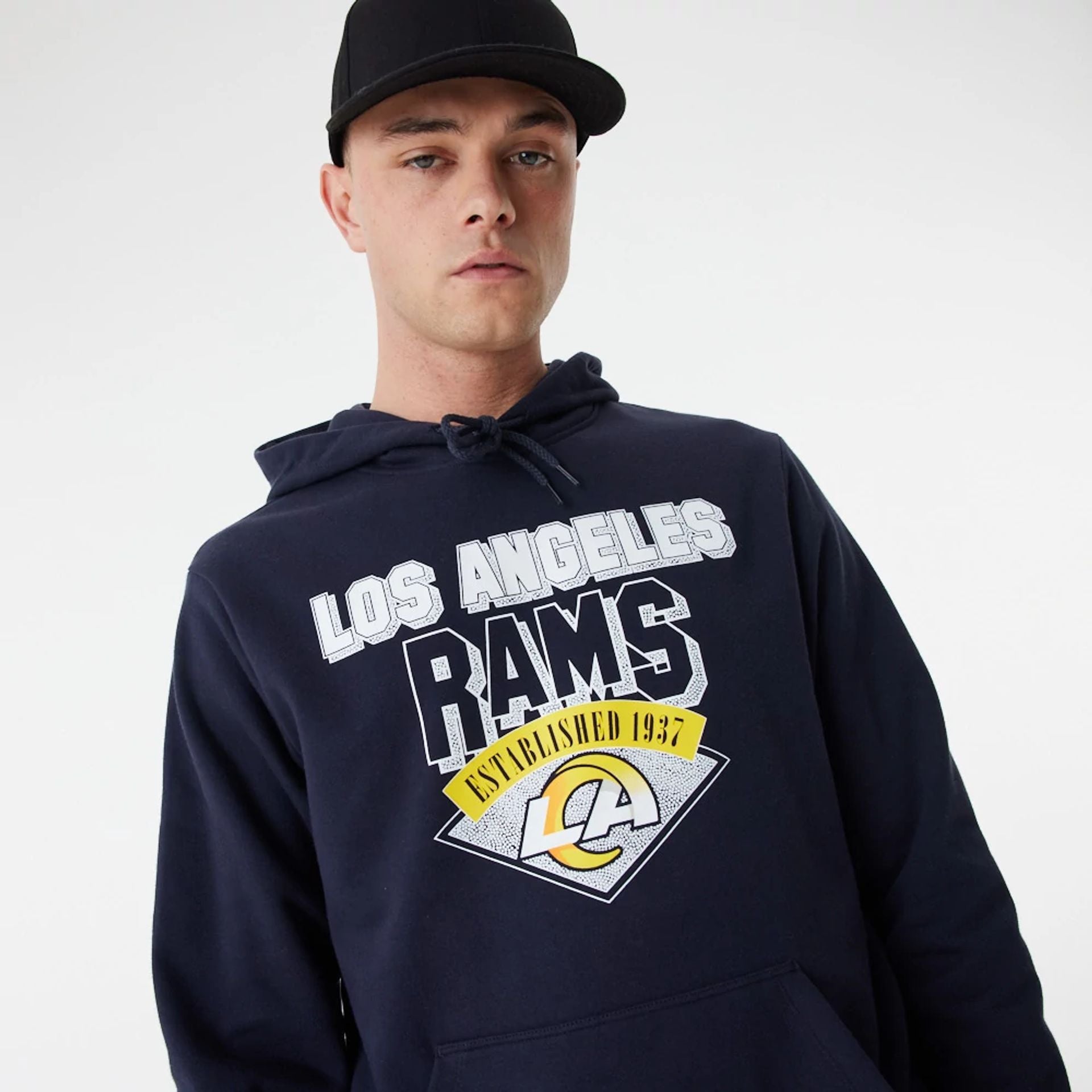 The Male model is wearing LA Rams NFL Team Graphic Navy Pullover Hoodie 1