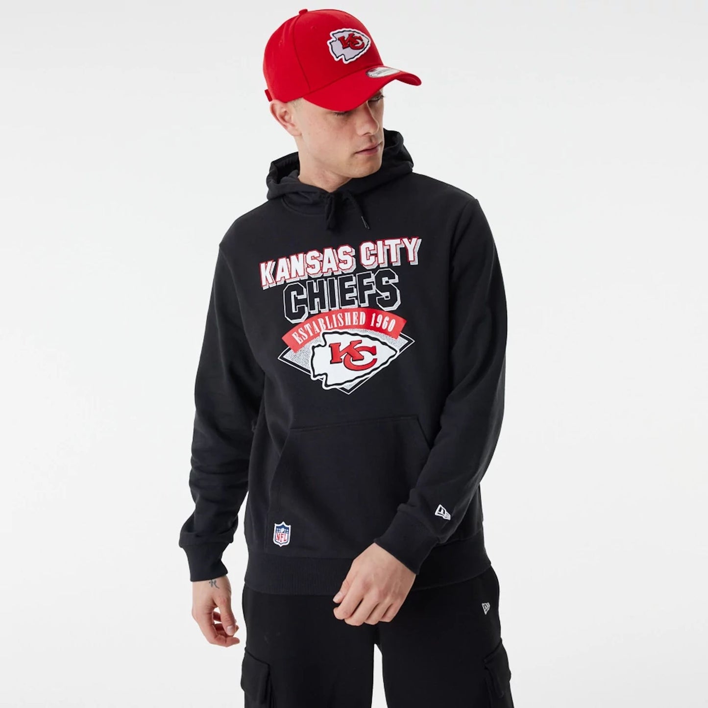 The Male model is wearing Kansas City Chiefs NFL Team Graphic Black Pullover Hoodie 1