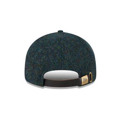 This is a New Era Harris Tweed Navy Retro Crown 9FIFTY Snapback Cap 4