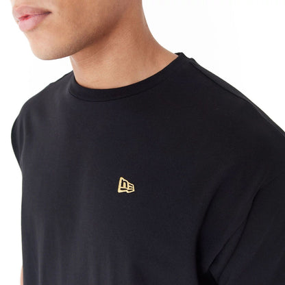 The Male model is wearing New Era Lifestyle 59FIFTY Black Oversized T-Shirt 6