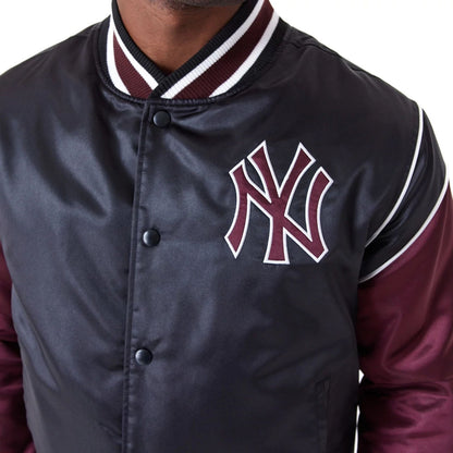 The Male model is wearing New York Yankees MLB Black Satin Jacket 1