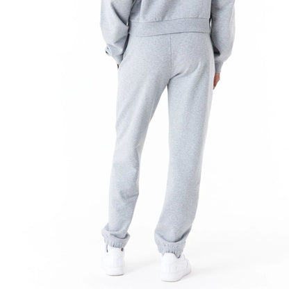 The Female model is wearing New Era Womens Arch Wordmark Grey Joggers 4