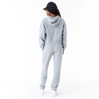 The Female model is wearing New Era Womens Arch Wordmark Grey Joggers 2