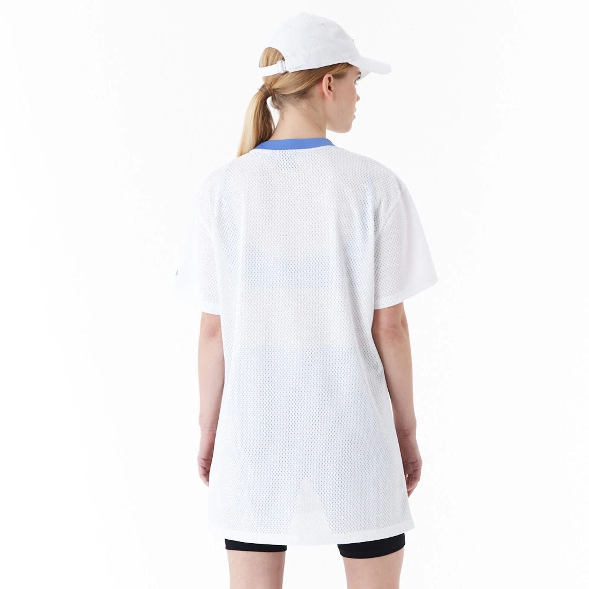 The Female model is wearing New Era Womens Arch Wordmark White Mesh Dress 6