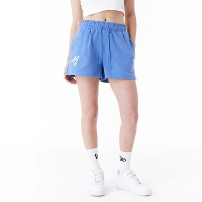 The Female model is wearing New Era Blue Womens Sweat Shorts 1