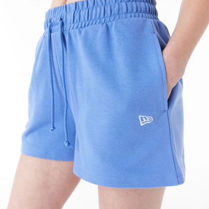 The Female model is wearing New Era Blue Womens Sweat Shorts 9